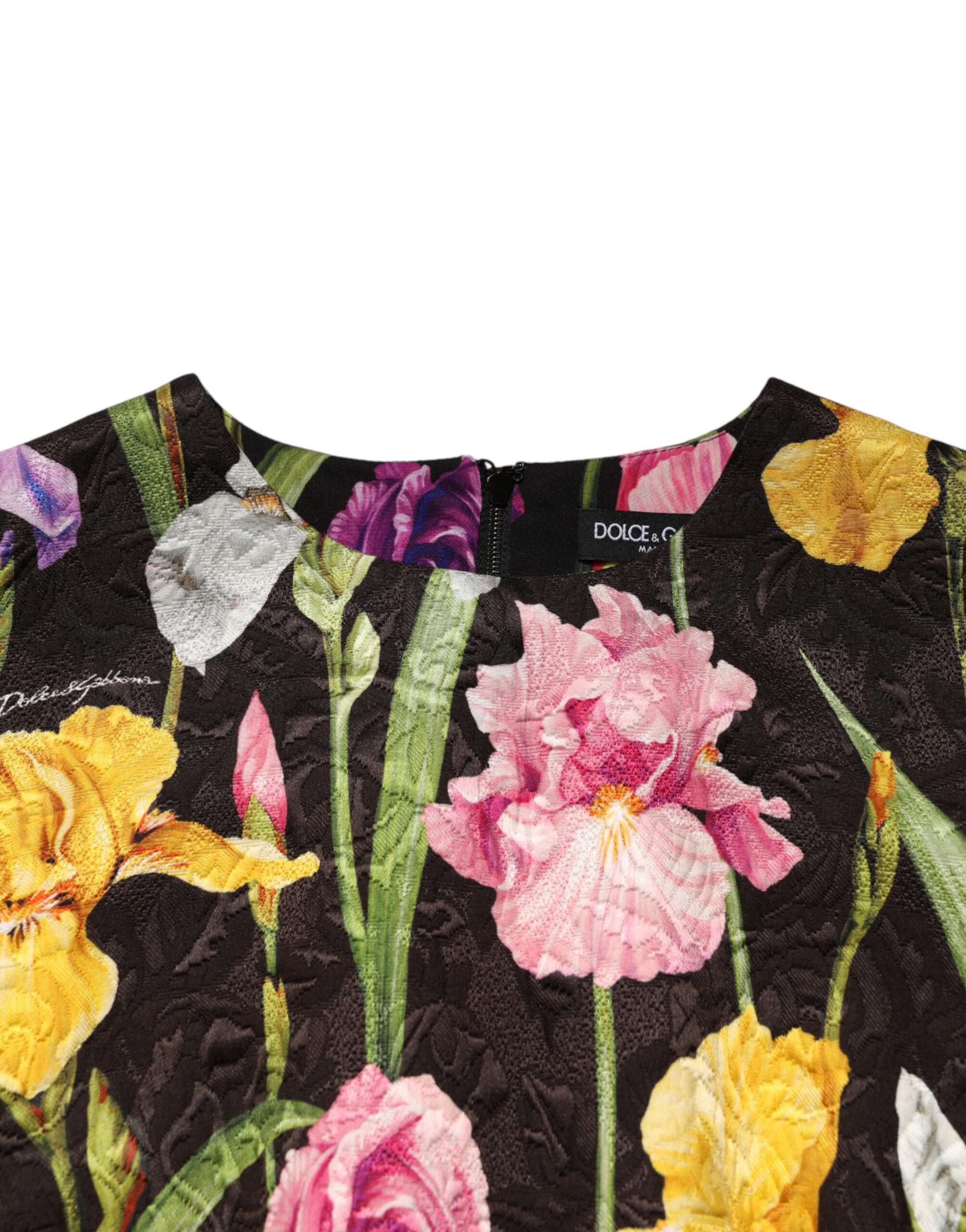 A black floral brocade dress with an A-line silhouette