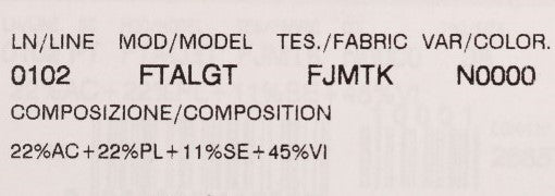 A label on a fabric item with various pieces of information including model number, color code, and other tec