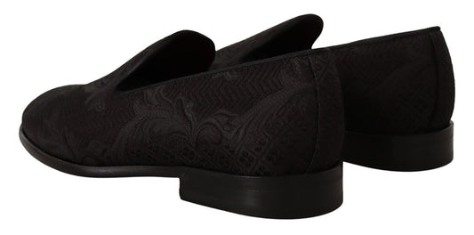 Pair of black shoes with patterned design on top and bottom