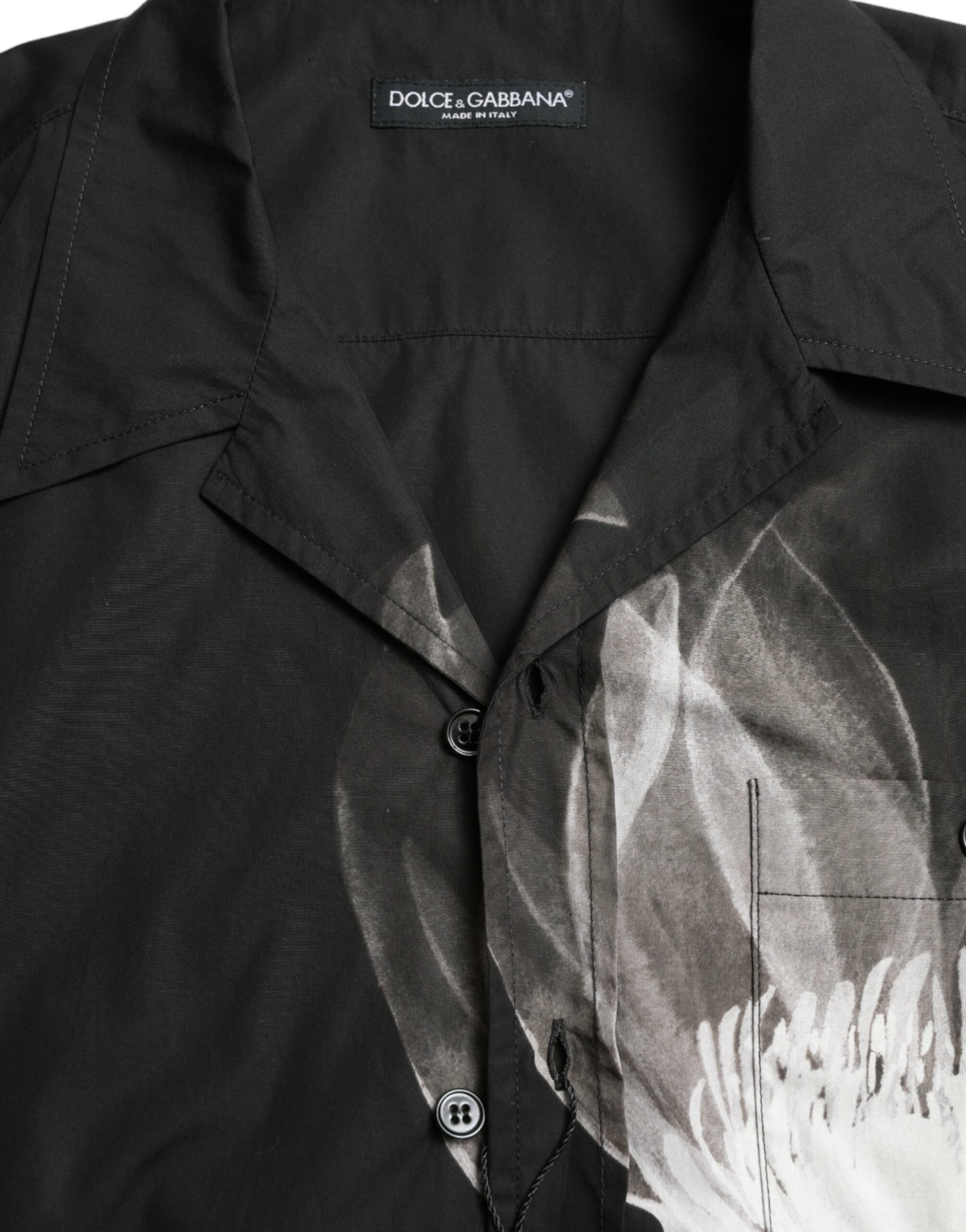 Black shirt with white design on front