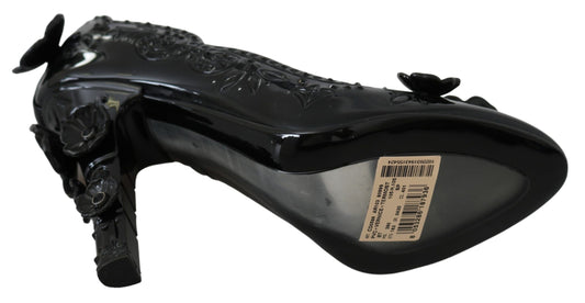 Black high heel shoe with strap and tag
