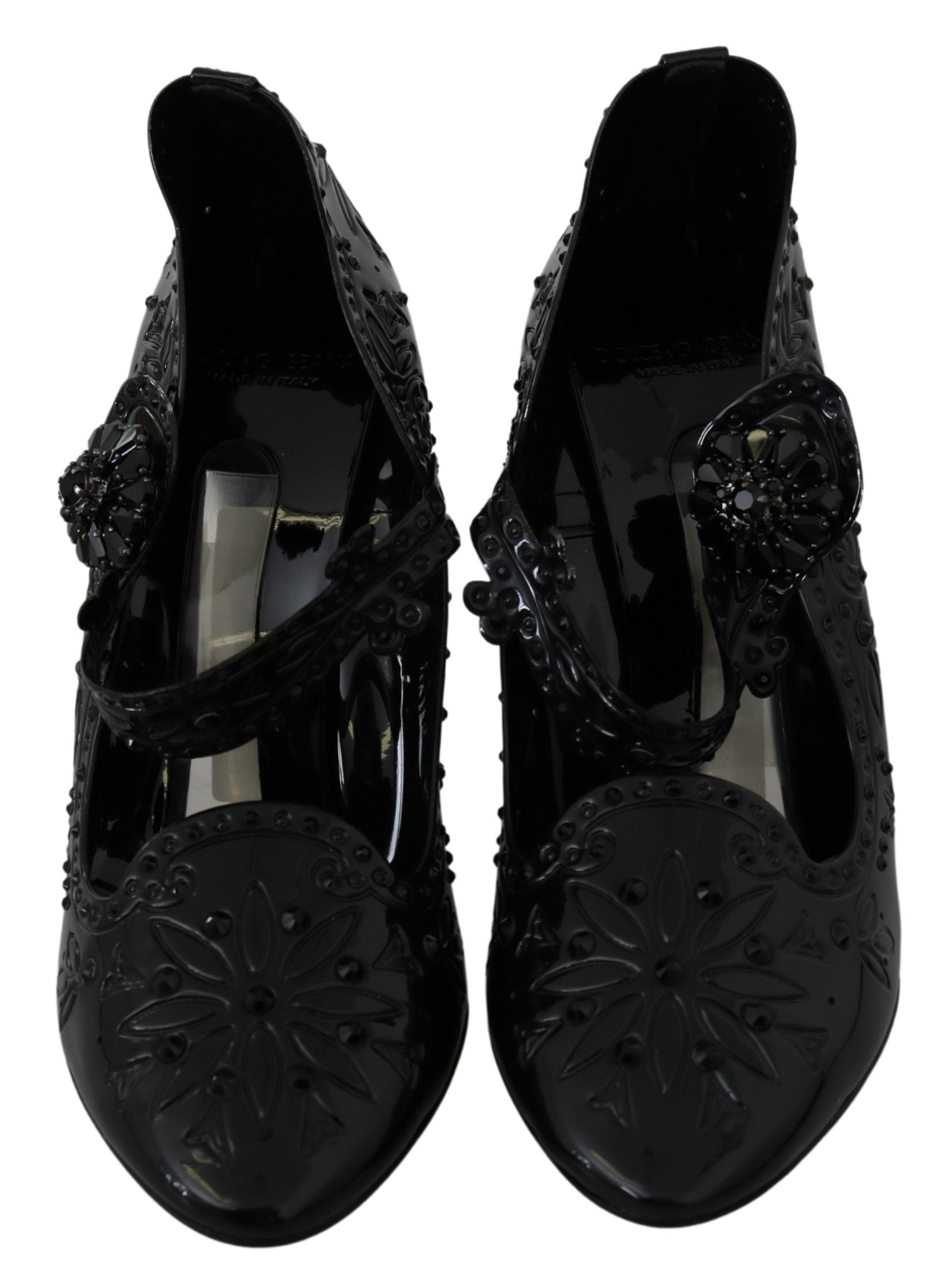 Pair of black women's shoes with embellishments and heels