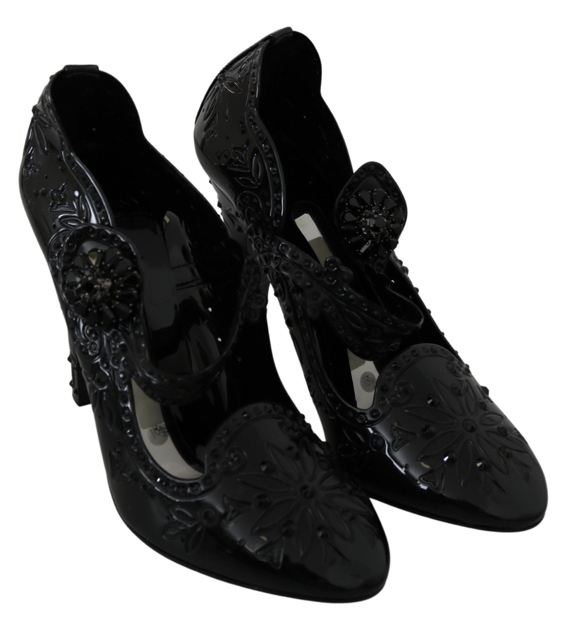 Pair of black high heel shoes with embellishments and straps
