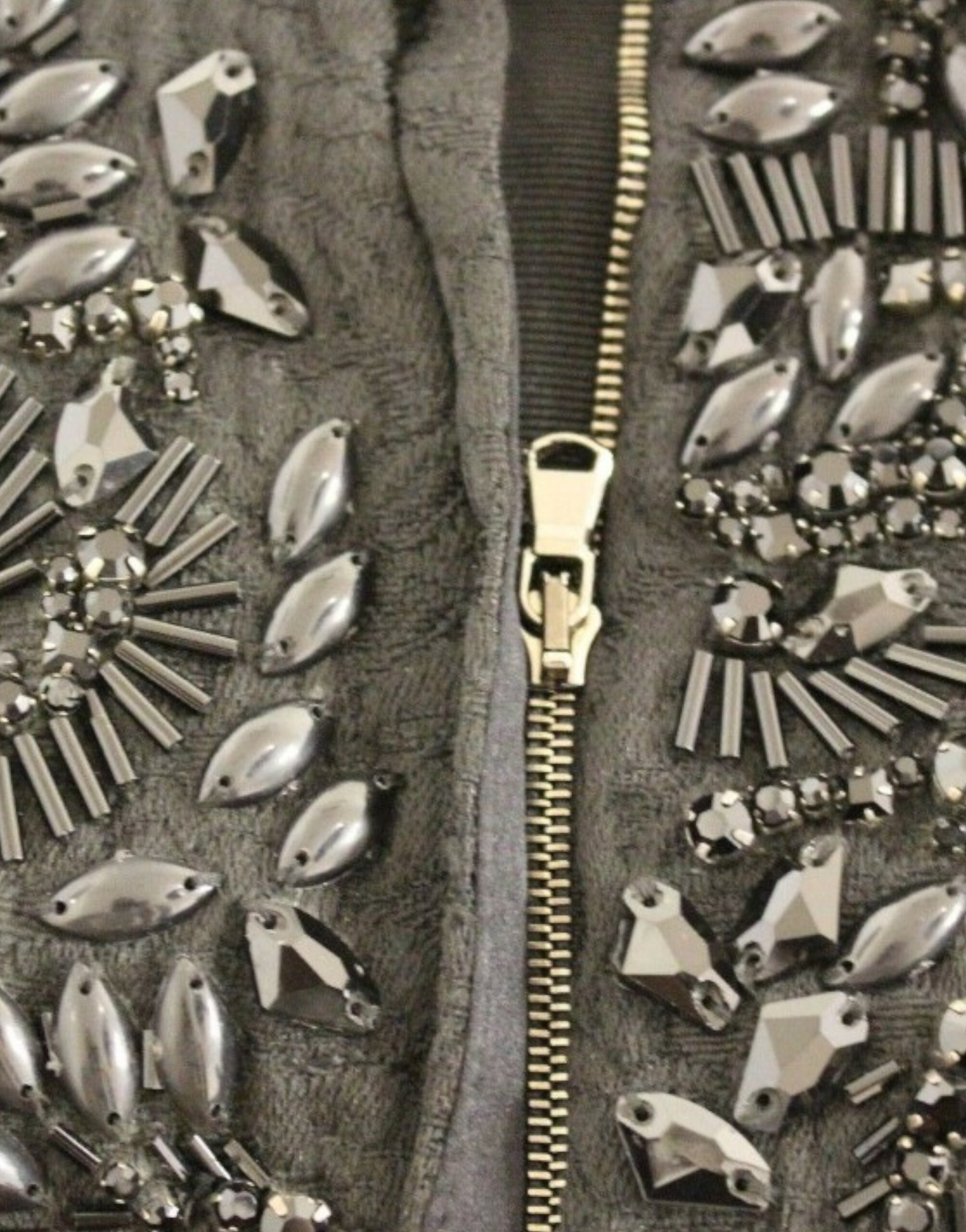 Decorative jacket with zipper and studs