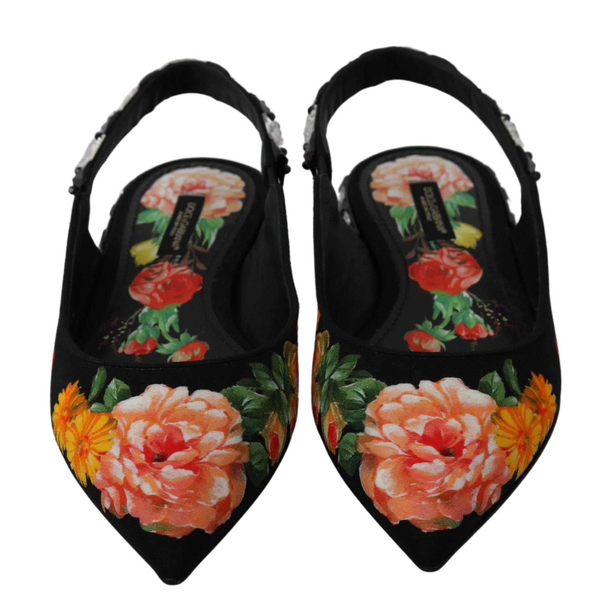 Pair of black high heel shoes with floral embroidery on toe and heel