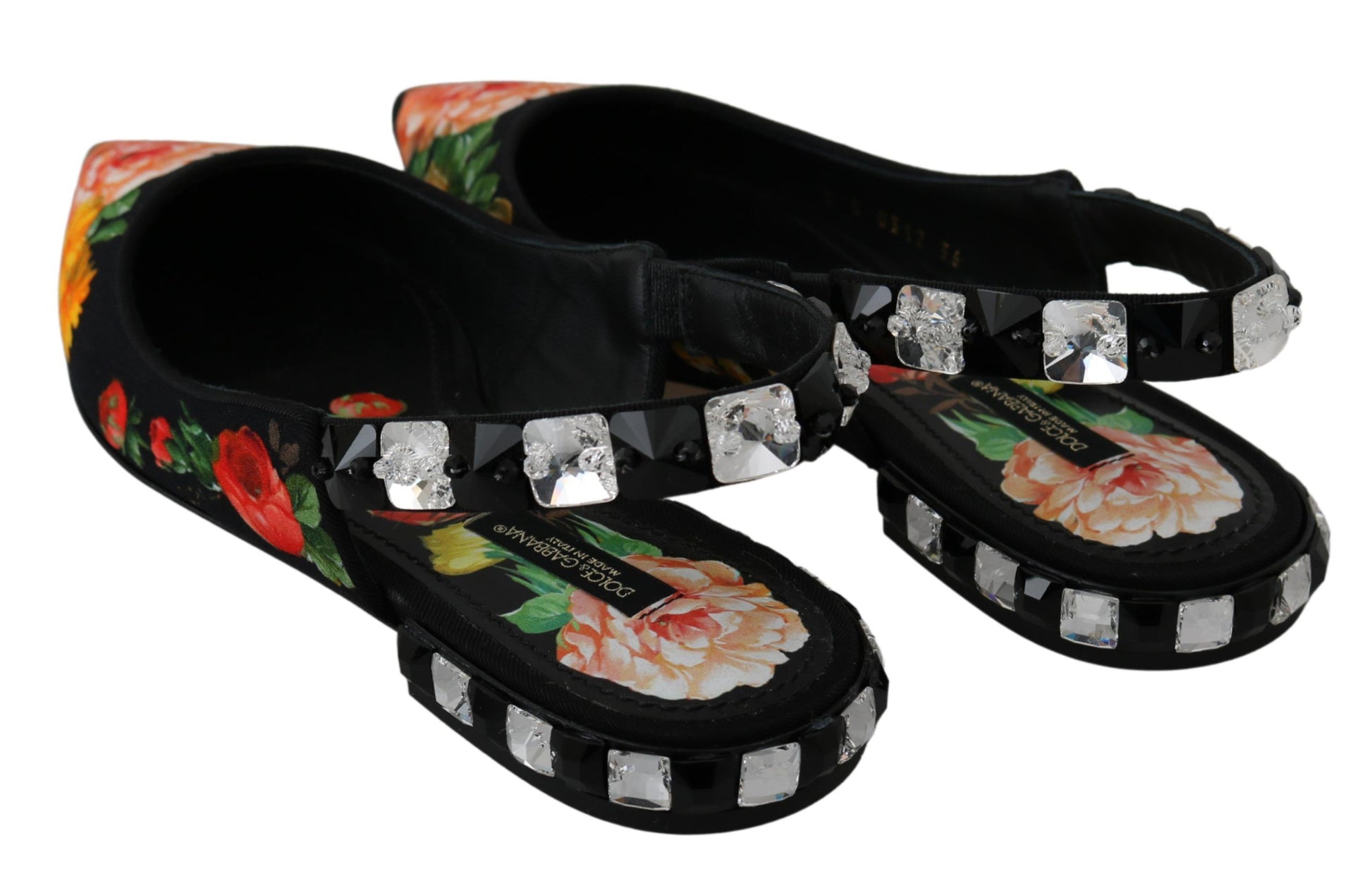 Pair of women's shoes with floral pattern and rhinestones on straps