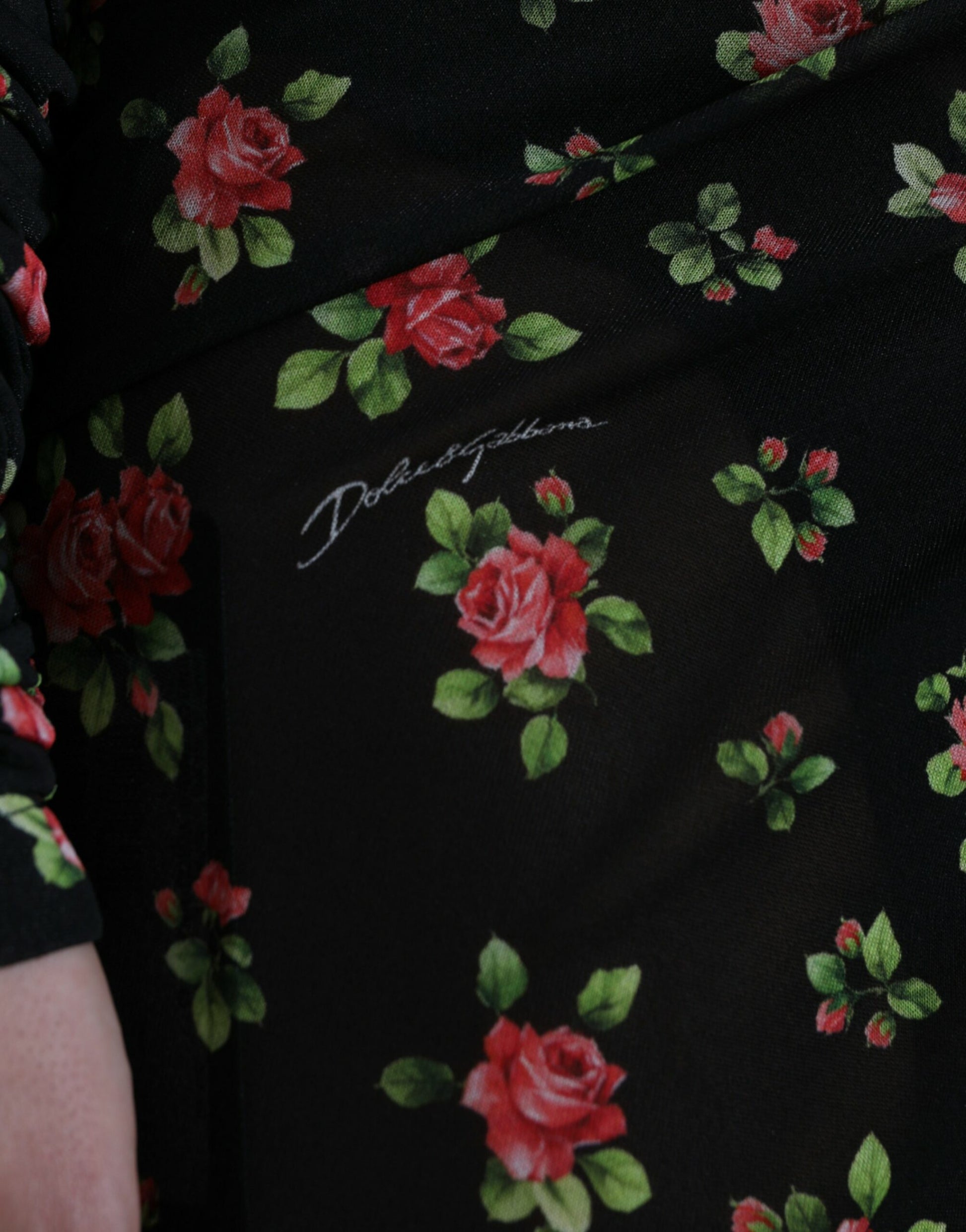 A black floral cut out sheath long maxi dress by Dolce & Gabbana