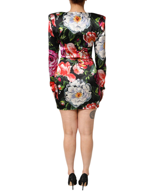 A black floral dress with short sleeves and a body-hugging fit