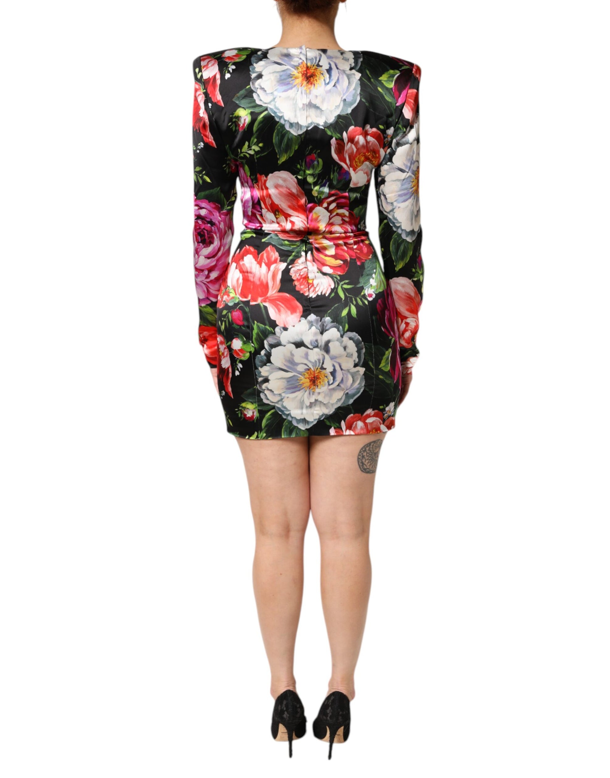 A black floral dress with short sleeves and a body-skimming fit