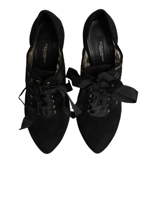 Pair of black sneakers with gold accents