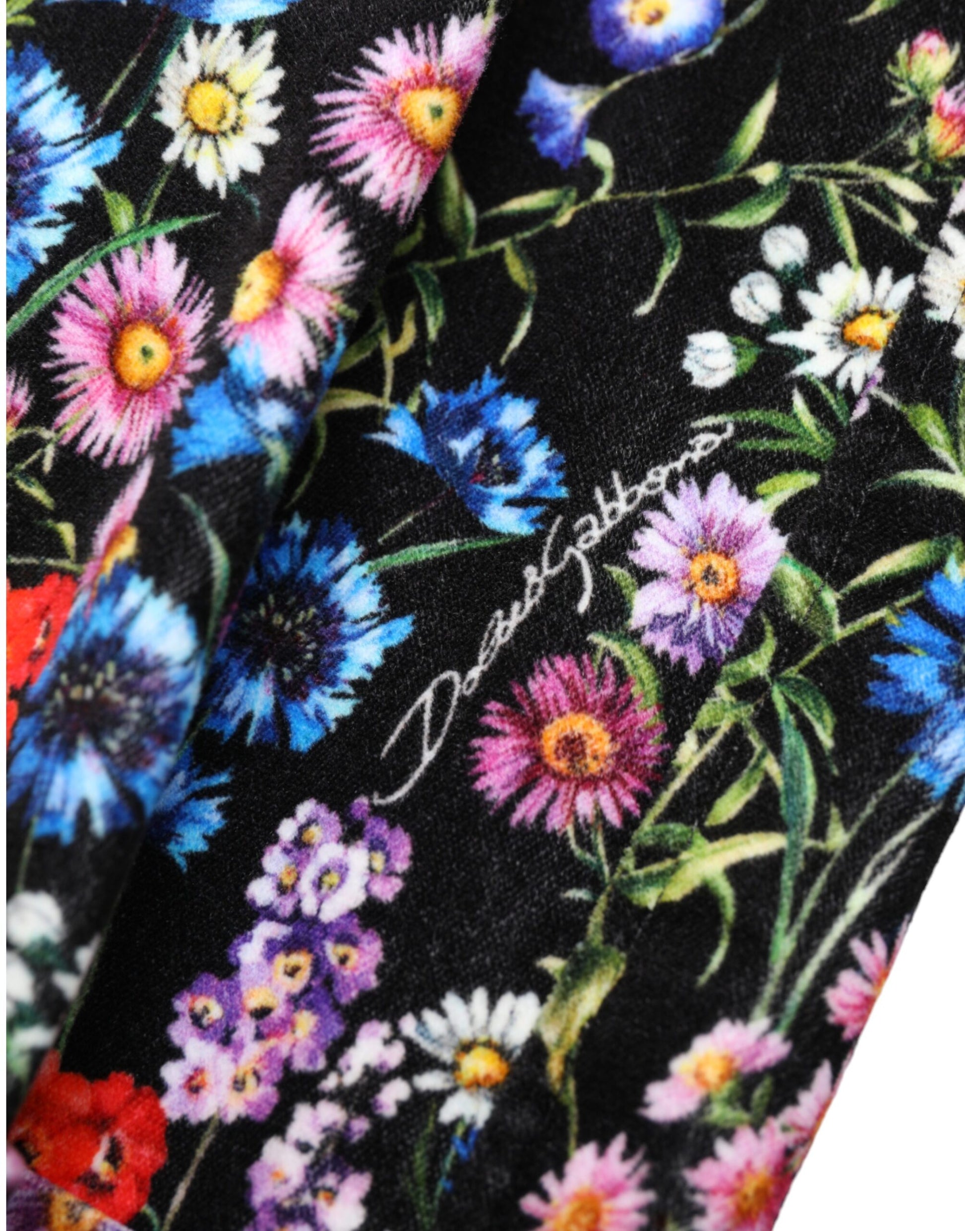 Floral pattern fabric with a signature on it