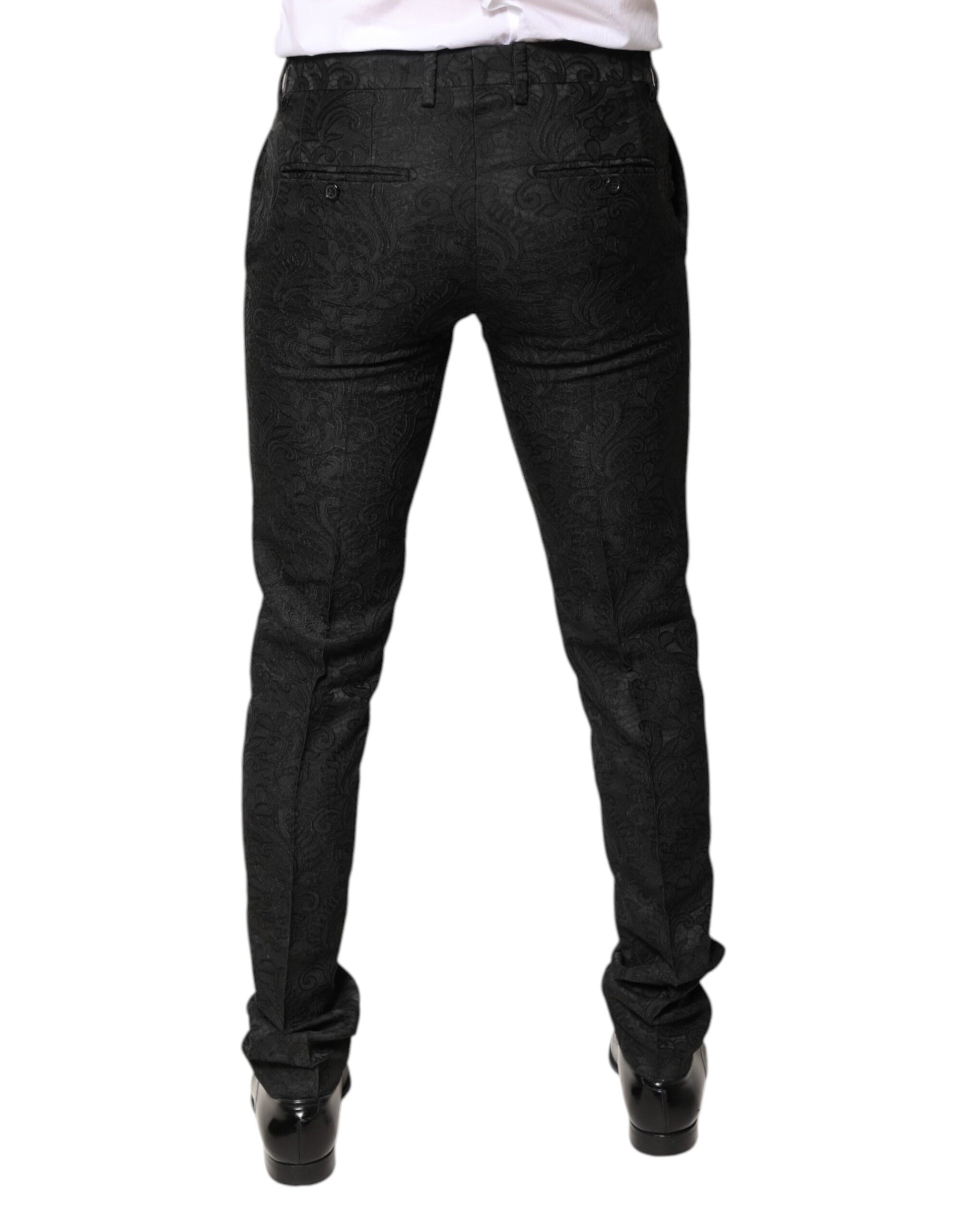 A pair of black floral jacquard mid waist dress pants by Dolce & Gabbana