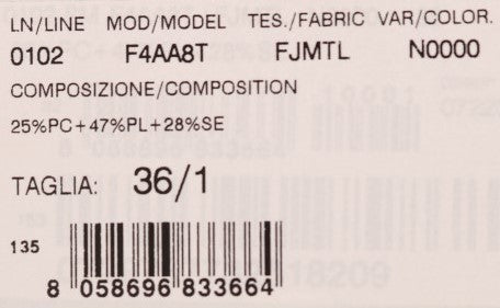 White label on fabric with black lettering