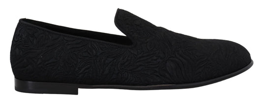 Pair of black shoes with a patterned design on the side