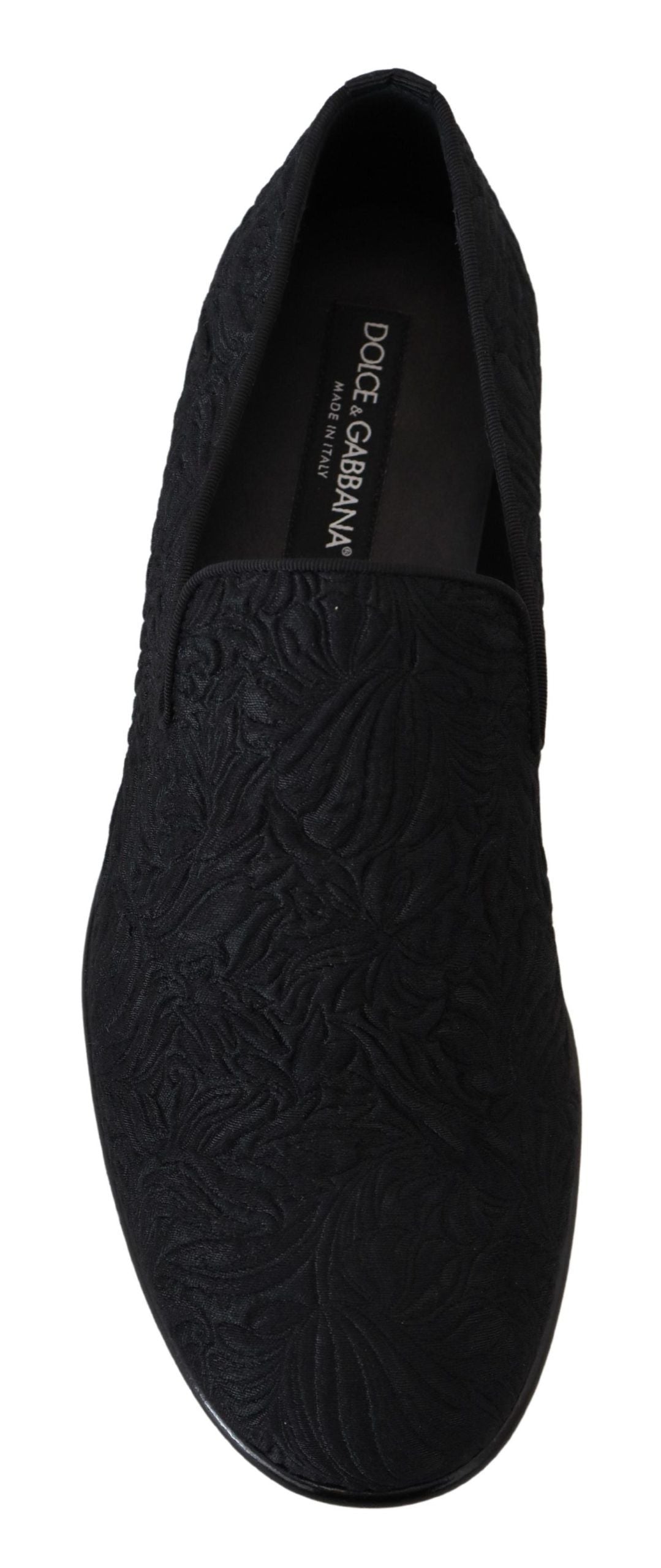 Black velvet loafer shoe with embossed design on vamp and heel