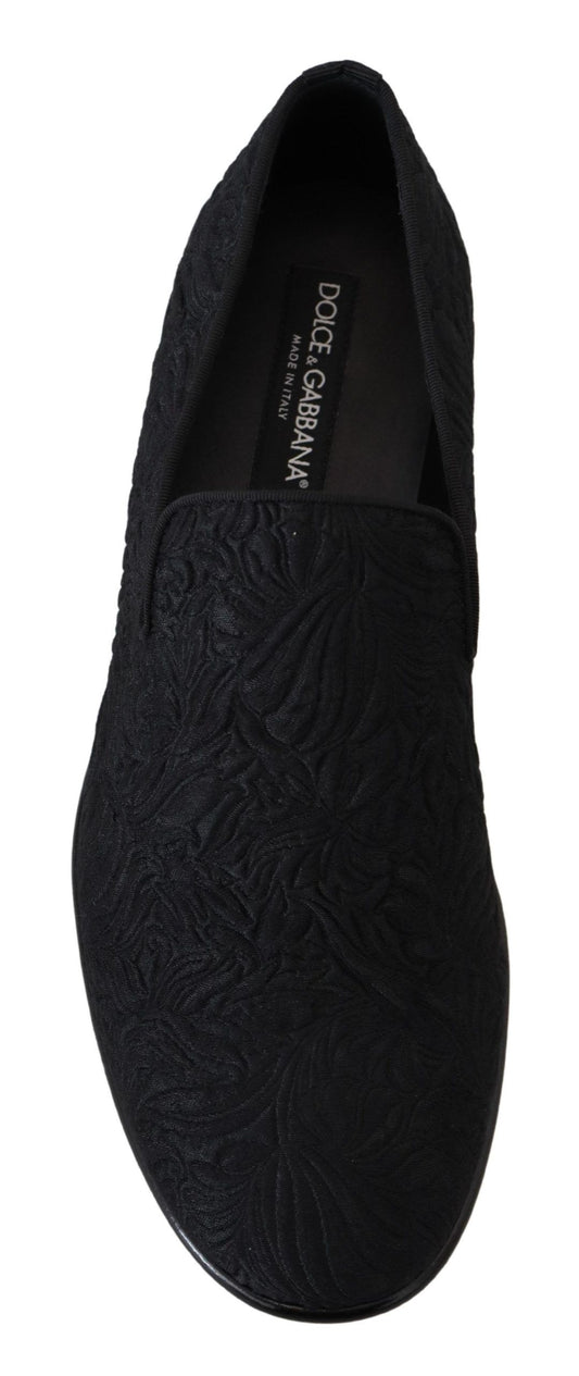 Black velvet loafer shoe with embossed design on vamp and heel