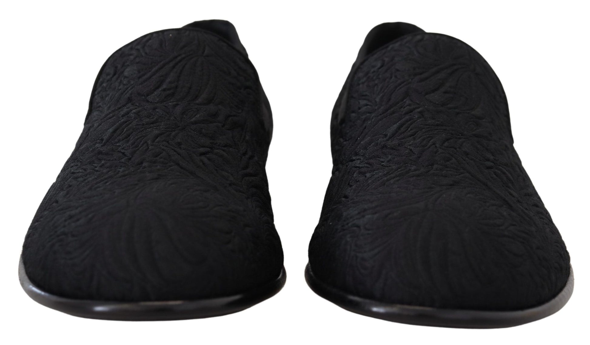 Pair of black slippers with a patterned texture