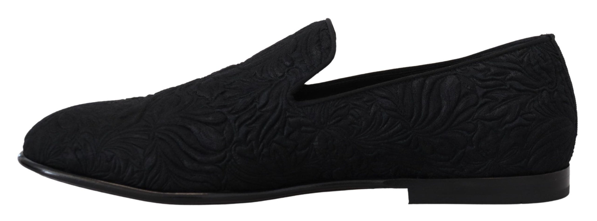 Pair of black shoes with a patterned design on the side