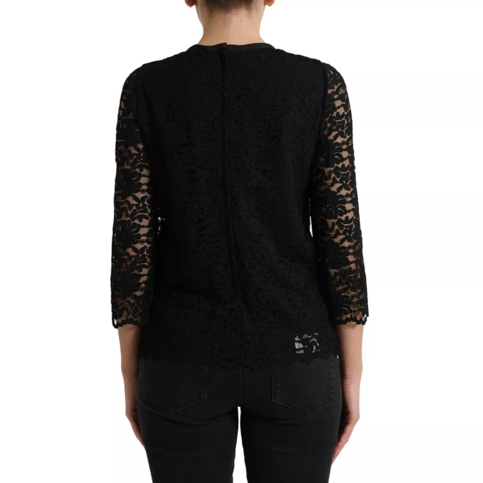 Black lace back top on woman