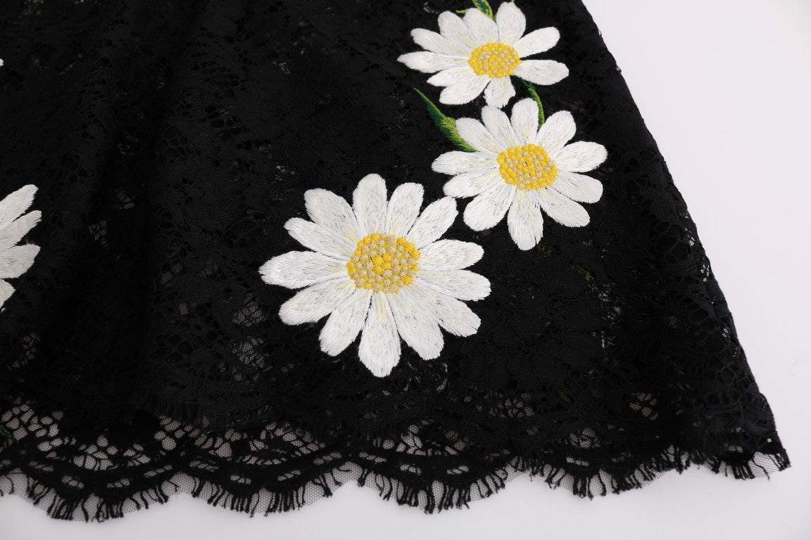 Black lace skirt with white daisies embroidered on it