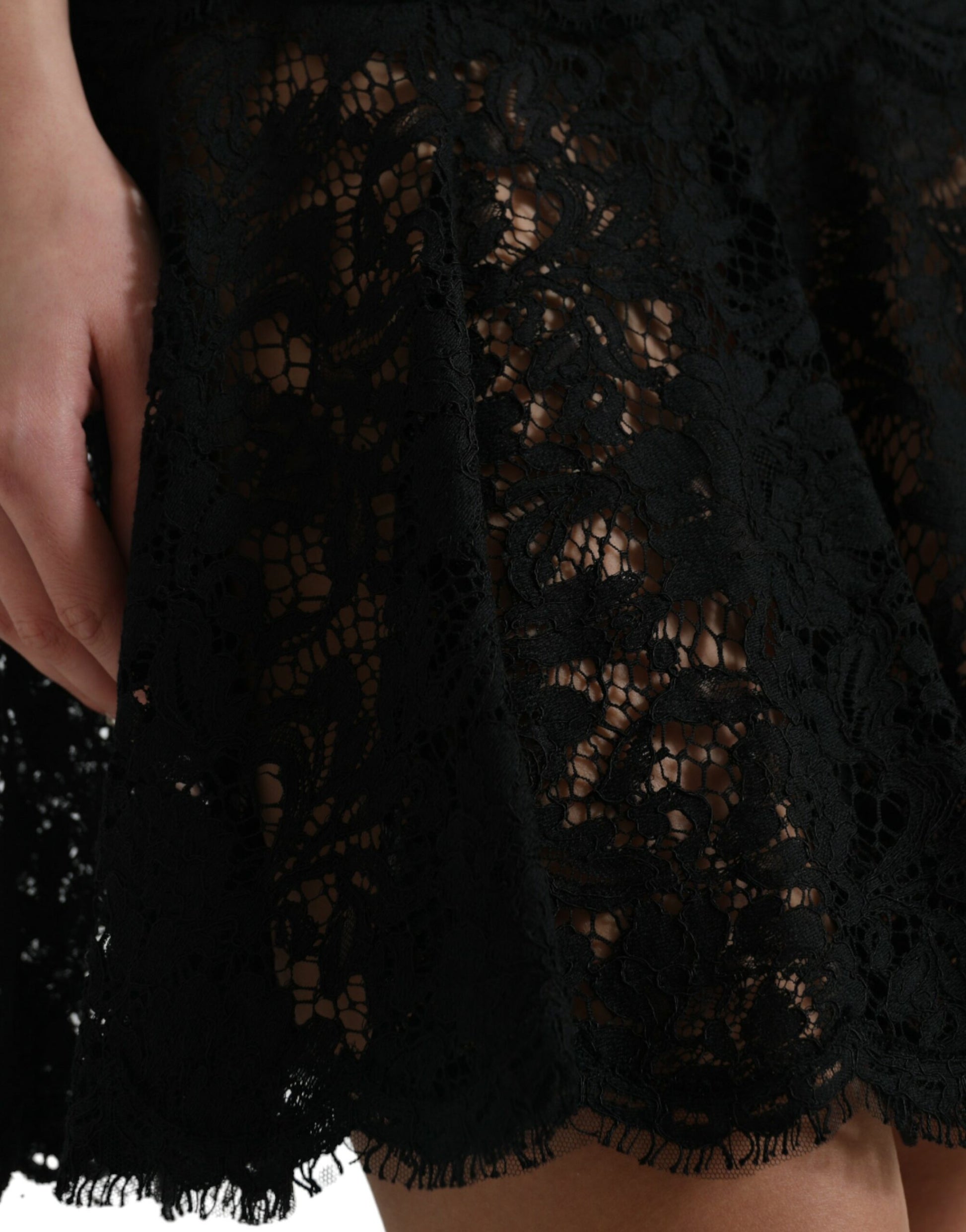 Black lace dress with floral pattern, cotton fabric, and A-line silhouette