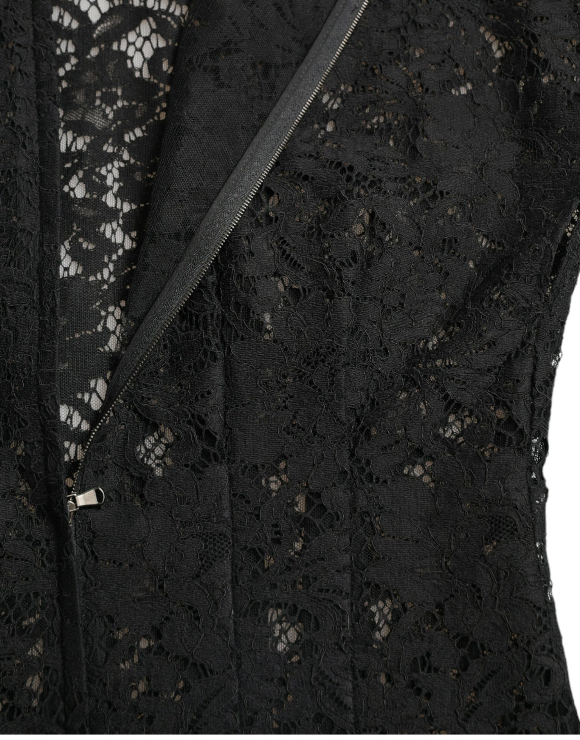 A black lace dress with floral patterns, featuring an A-line silhouette and a mini length. It has a zipper cl