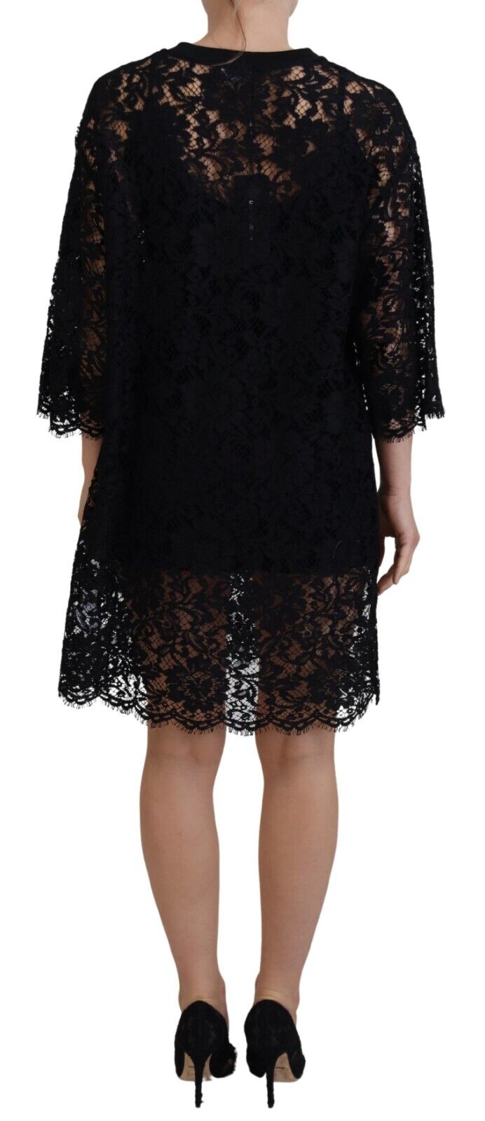 A black lace dress with floral pattern, featuring a shift style and mini length