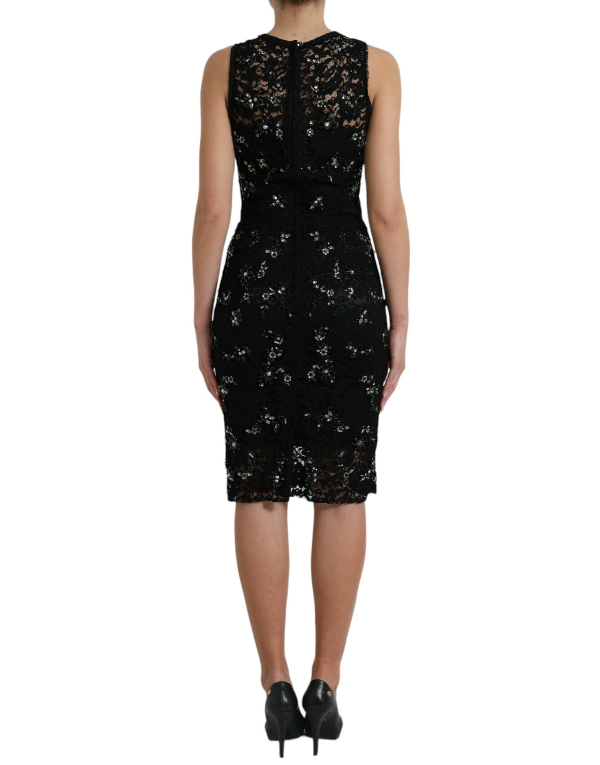 A black dress with floral lace and crystal embellishments