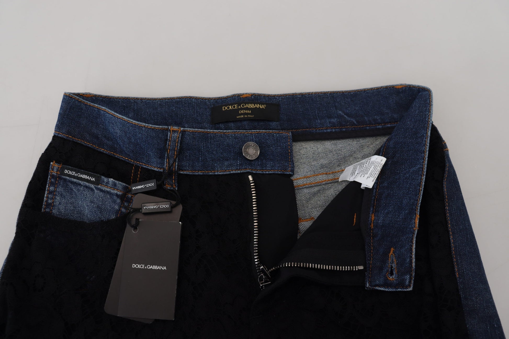 Blue denim jeans with tags inside