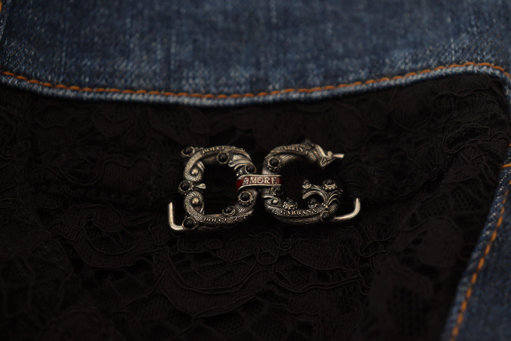Silver metal belt buckle with a dragon design