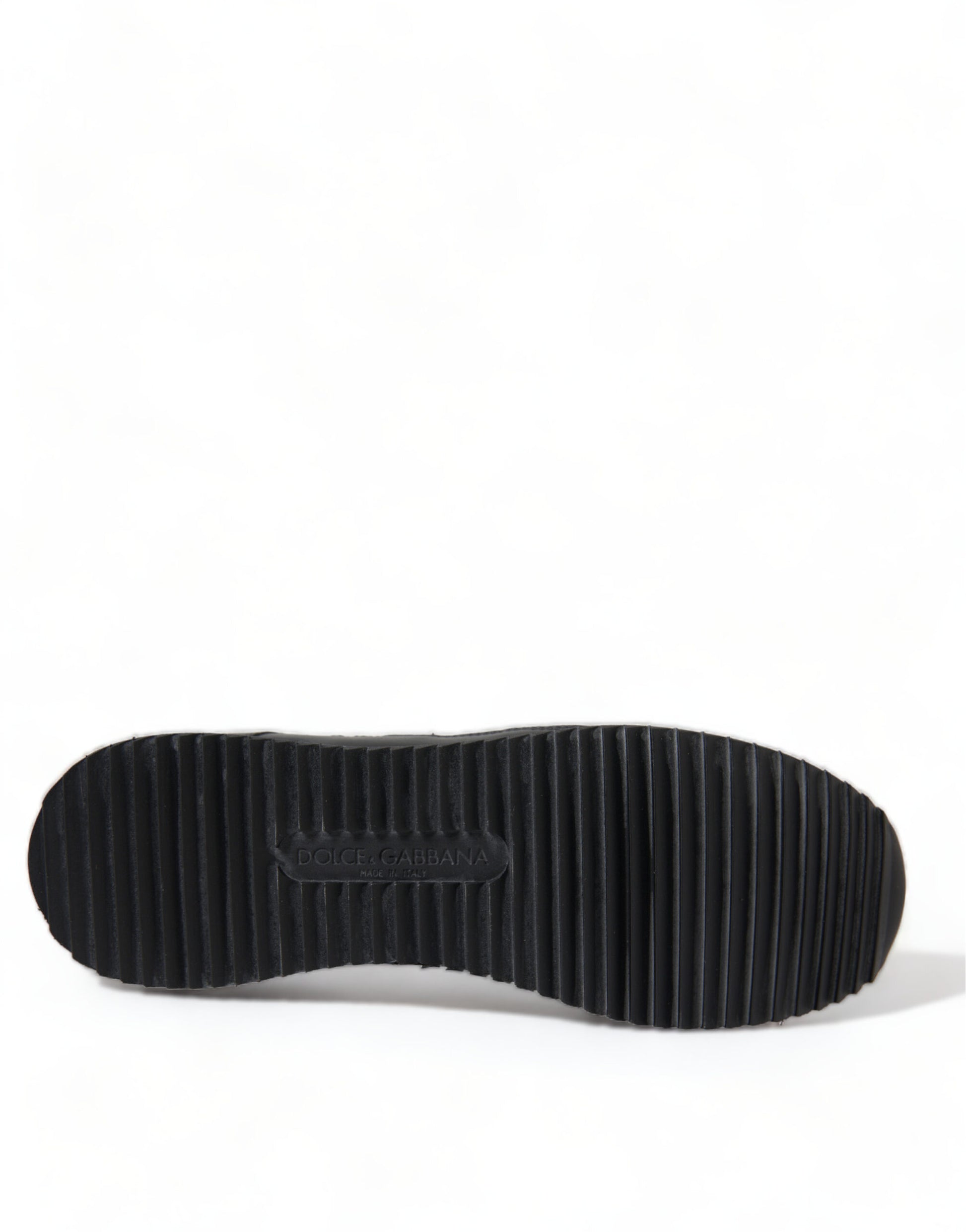 Black shoe with white logo on side
