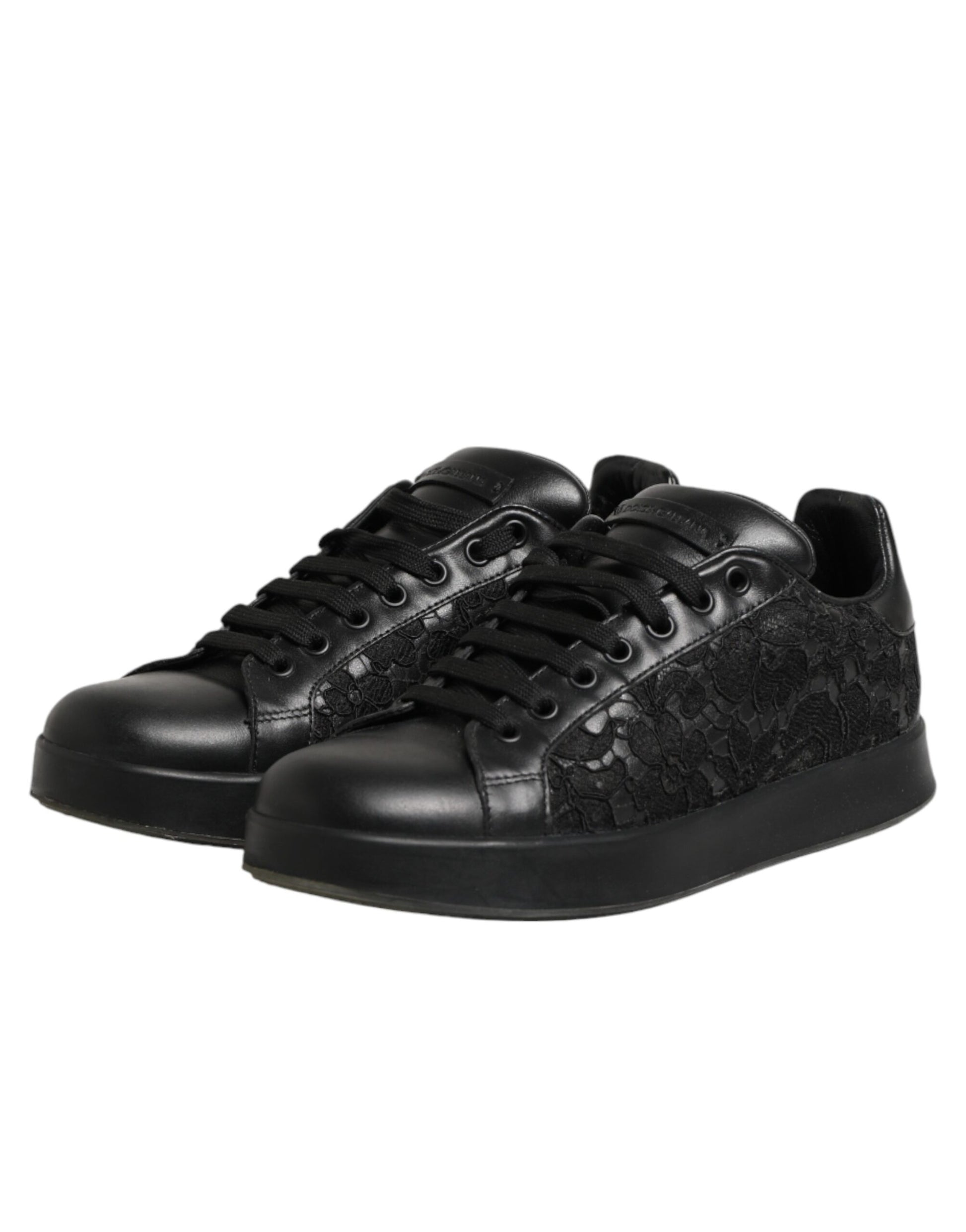 Black lace-up sneakers with floral pattern on side, featuring a low top and chunky sole