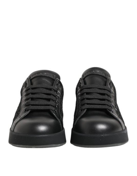 Pair of black children's shoes with laces