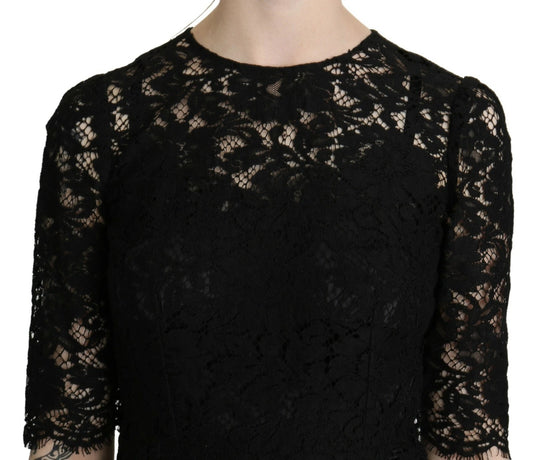 A black lace sheath dress with floral pattern, knee length, from the brand Dolce & Gabbana