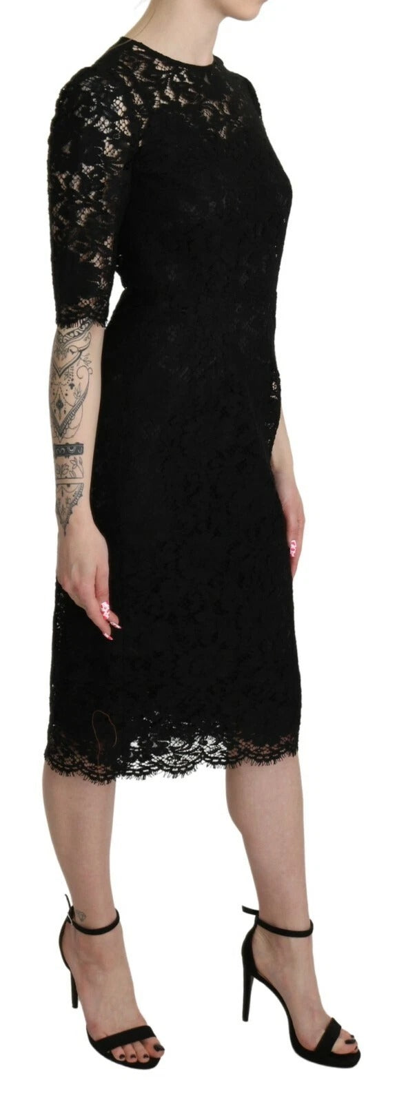 A black lace sheath dress with floral pattern
