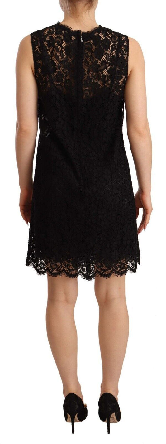 A black lace sheath dress with floral pattern, sleeveless and mini length