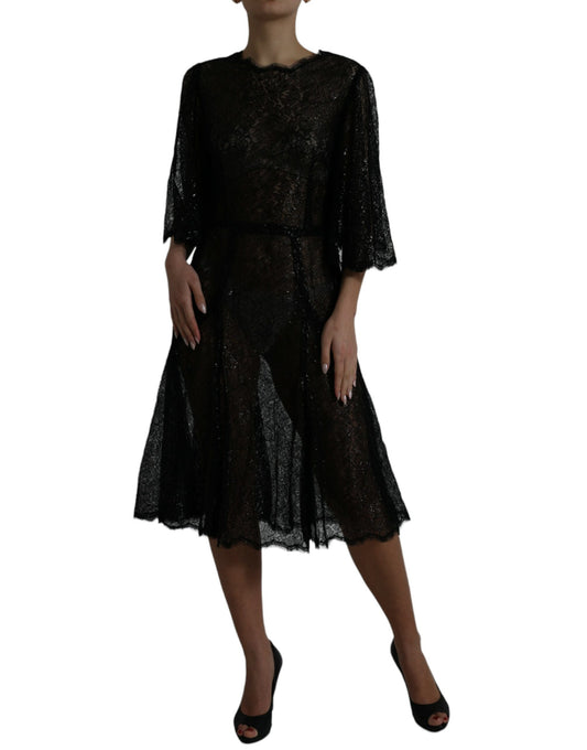 A black floral lace sheer midi dress with a flared skirt