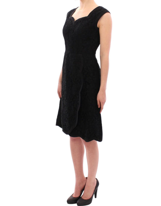 Black dress with short sleeves and a V neckline