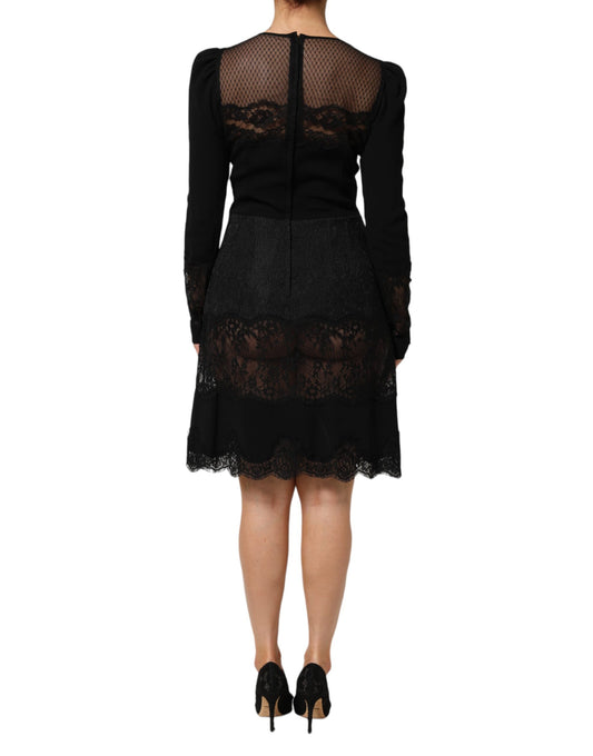 A black sheath dress with lace trim and floral pattern