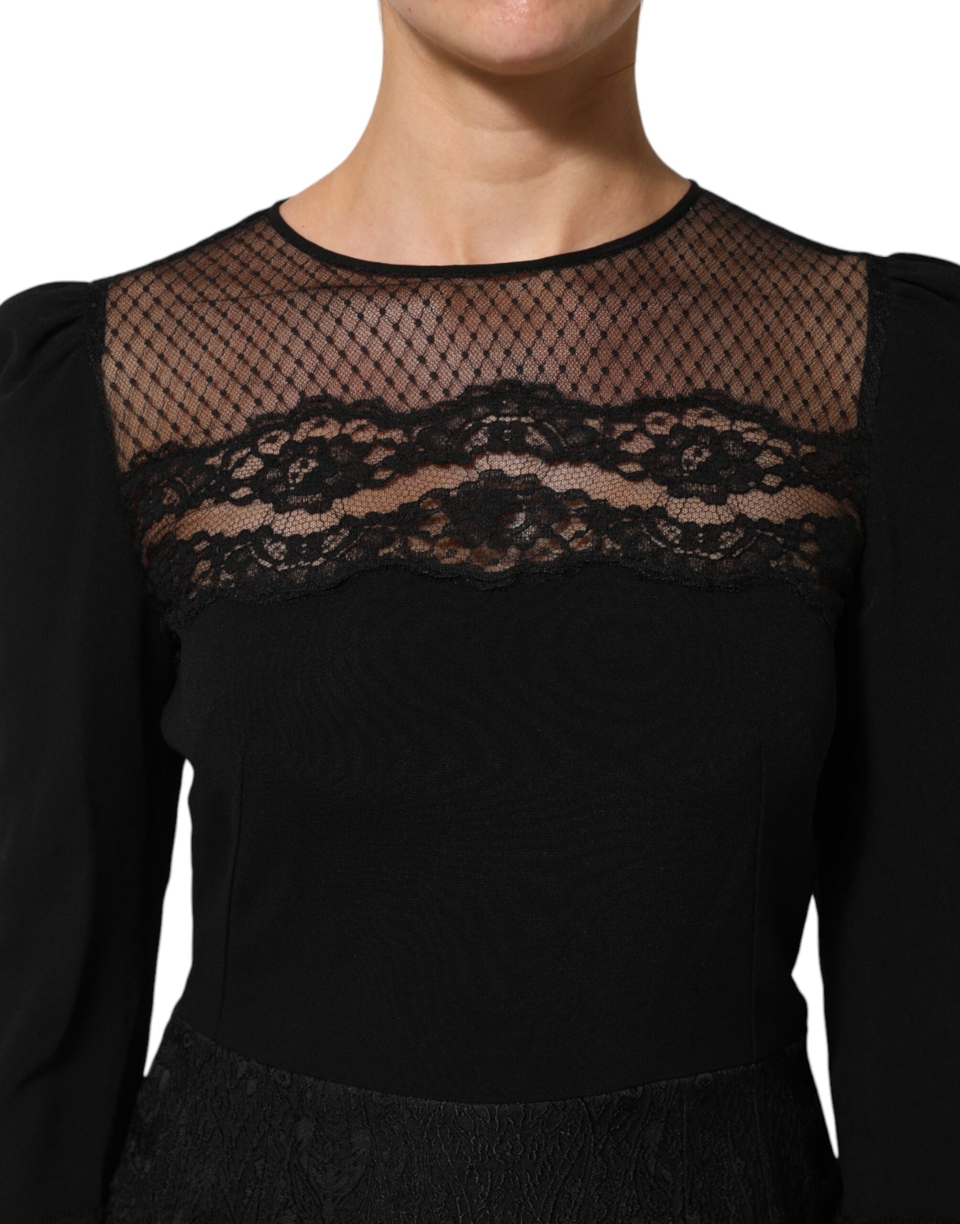Black lace sheath dress with floral trim and long sleeves