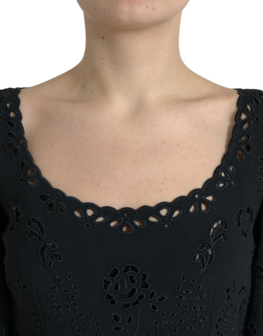 A black lace midi dress with floral pattern, viscose material