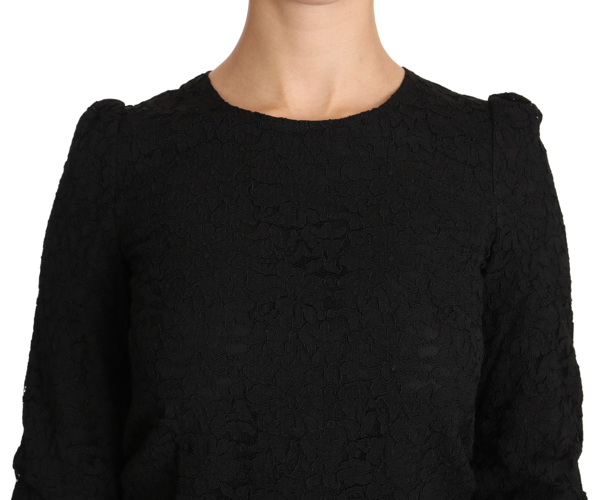 Black knitted sweater with ribbed neckline