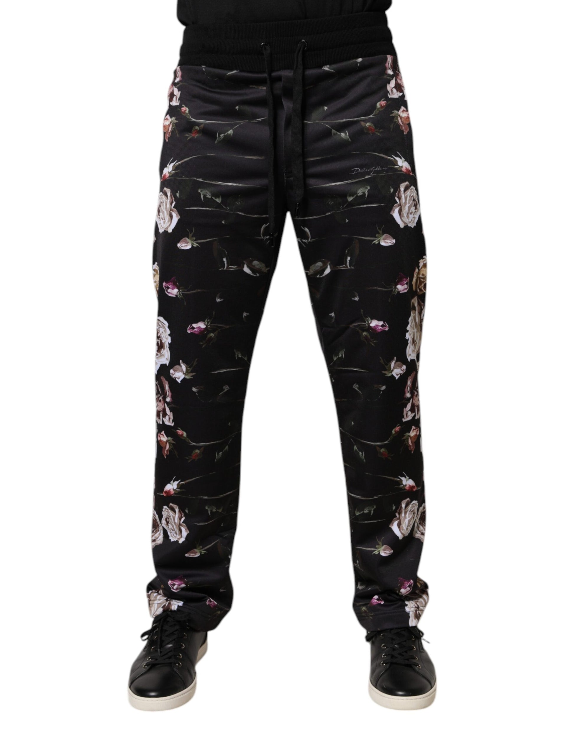 Pair of black pants with floral pattern on legs
