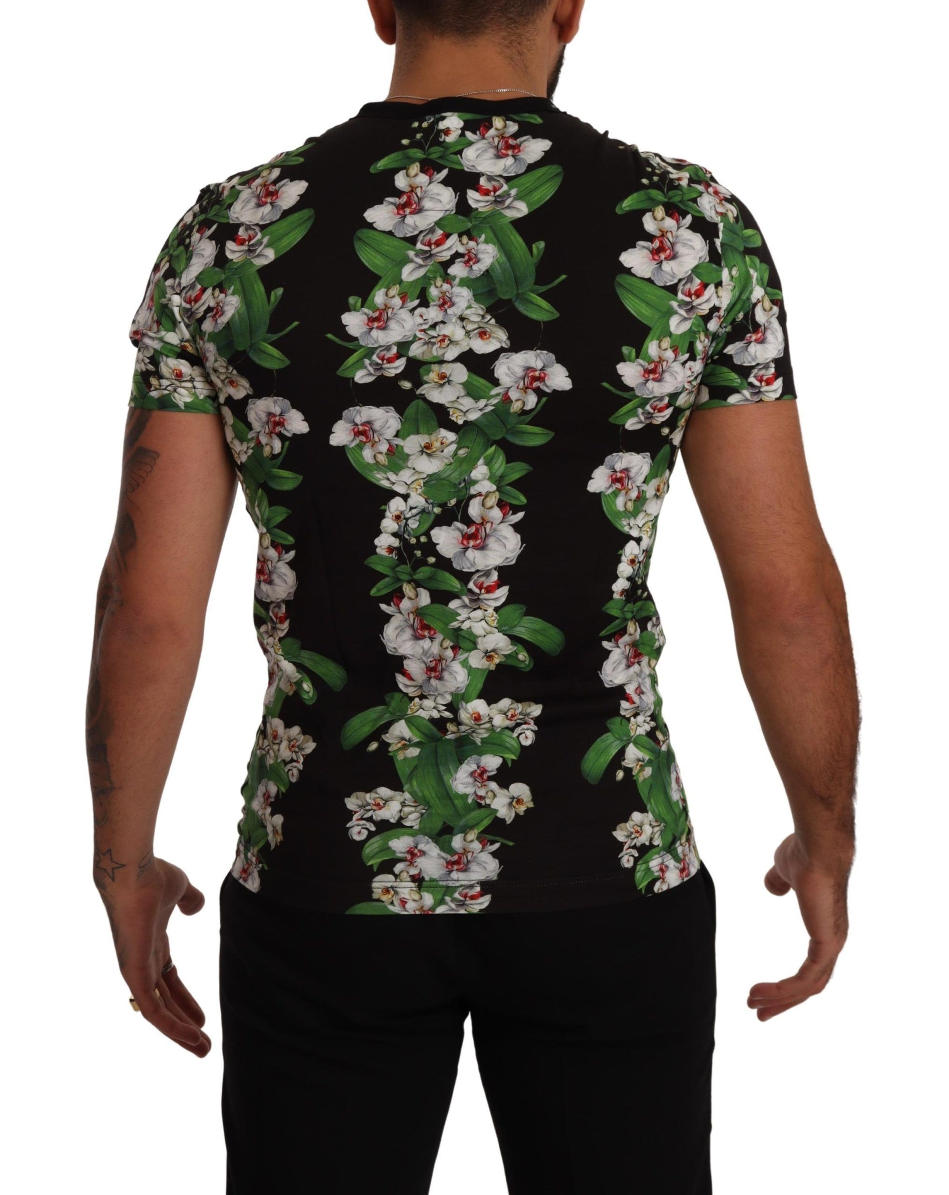 Man wearing black shirt with floral pattern on back
