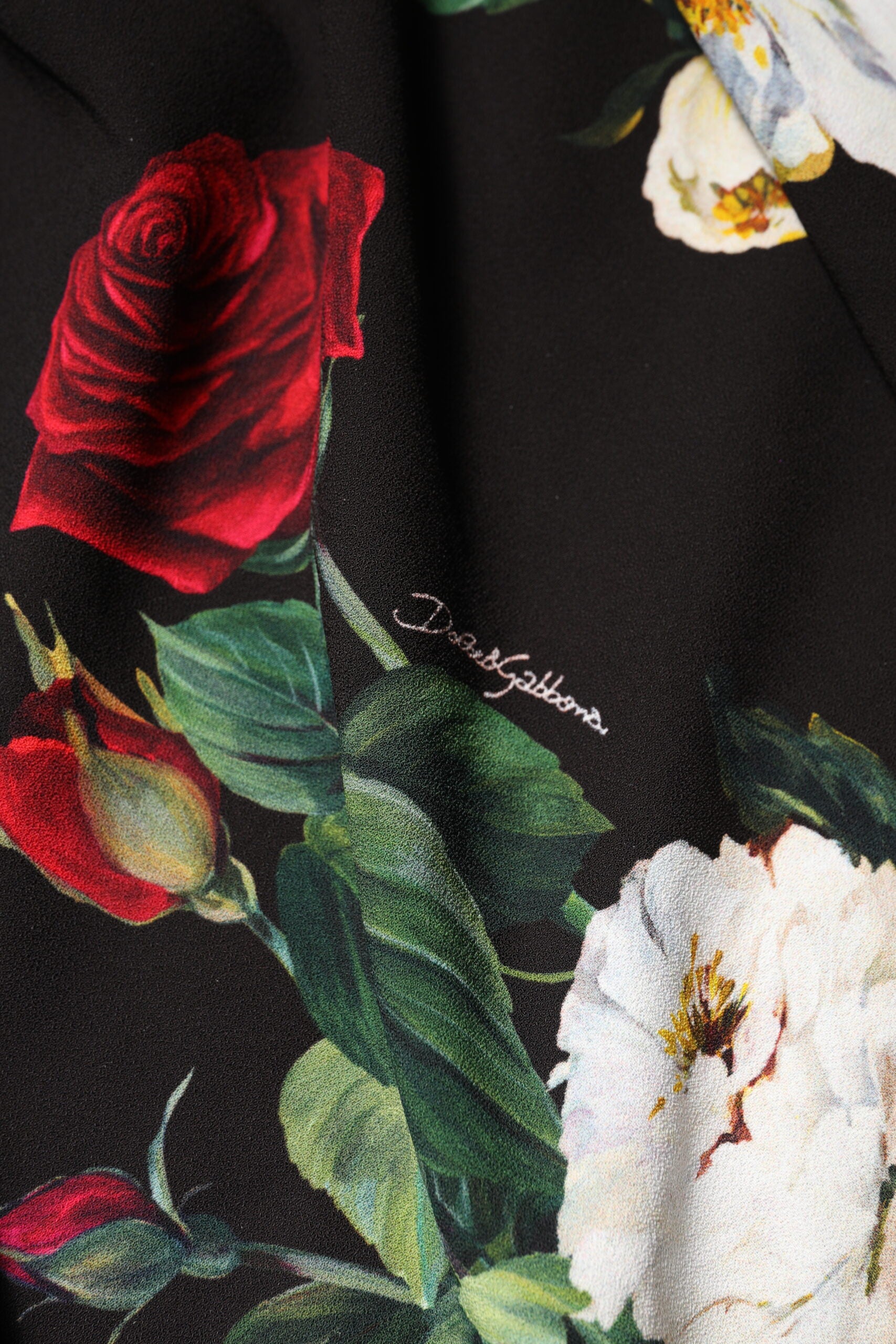 A black floral print sleeveless sheath dress from Dolce & Gabbana