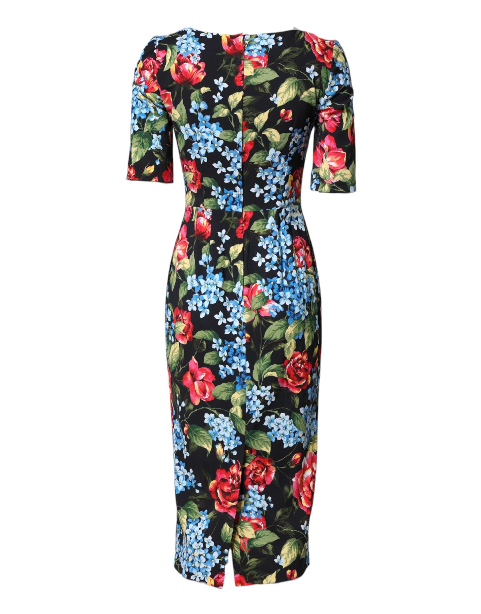 A black floral print midi dress with long sleeves and a sheath silhouette
