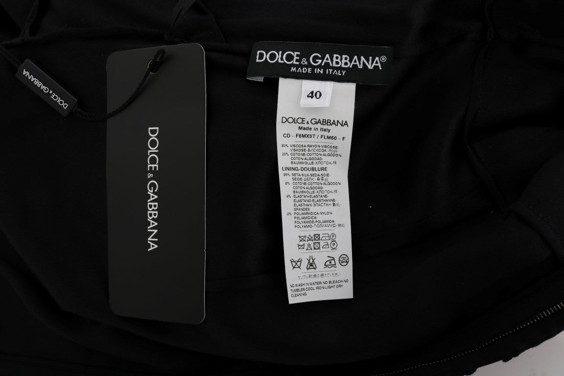 Black clothing item with tag attached to it