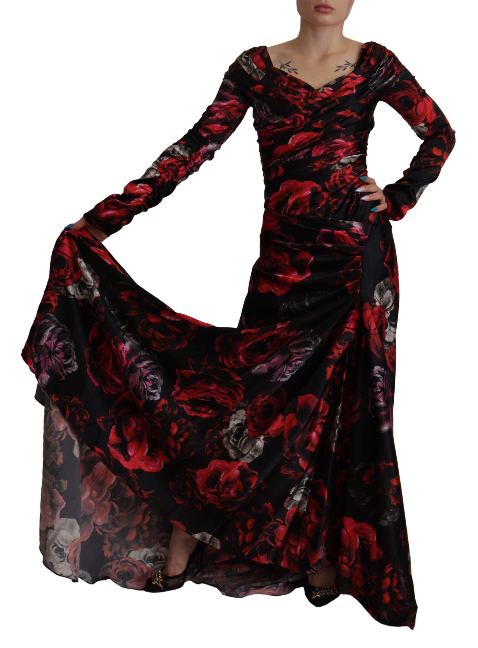 Long black floral dress with ruffled sleeves and train