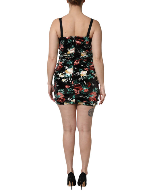 A sleeveless sheath dress with floral sequin pattern