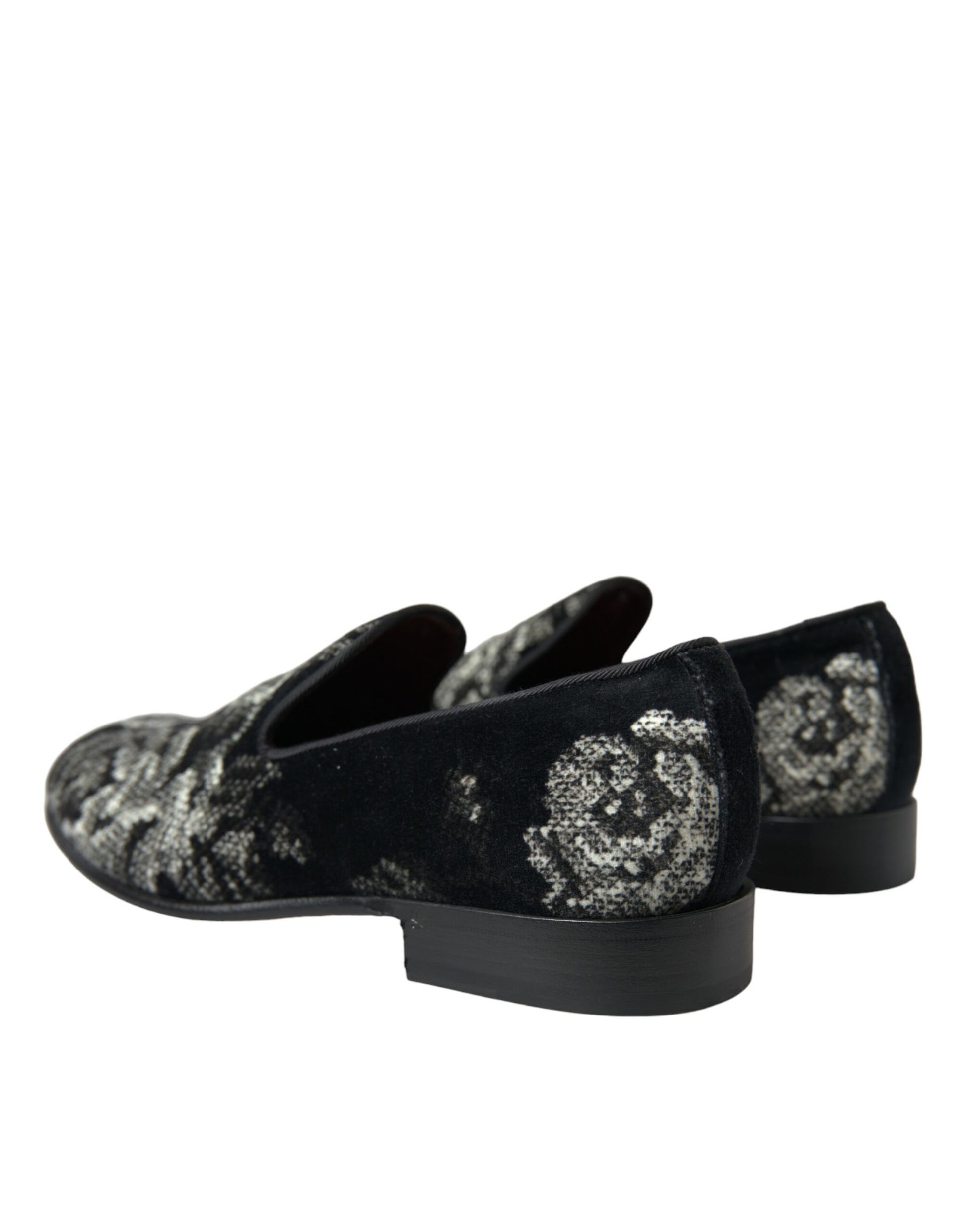 Pair of black velvet shoes with floral embroidery on heels and toes